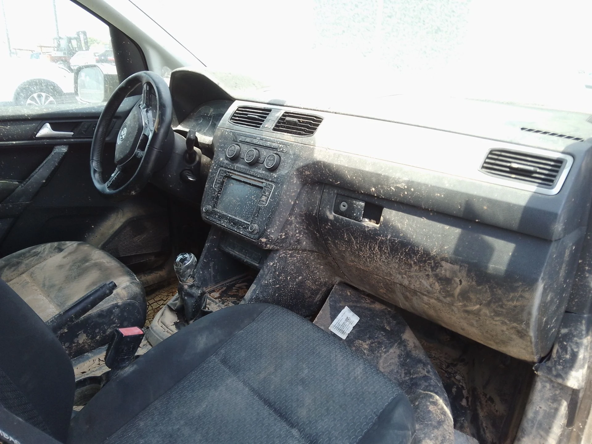 Muddy Volkswagen Caddy interior reference photograph